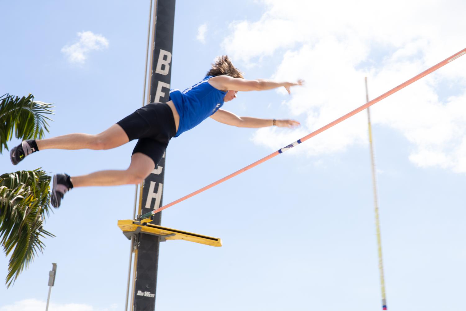 Connor Gannon passes the bar in the men's pole vaulting event held at the track and field Beach Opener in Long Beach, CA, on Friday, March 4, 2022.