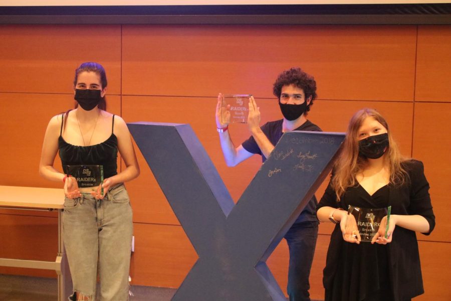 Alette Laughton (left), David Katz (center), and Abbey Austin-Wood hold glass plaques to commemorate them speaking at ASMCs RaiderX event on March 23, 2022. Photo credit: Claire Boeck