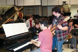 Pianist and Music major Matt Latta, 19, center, rehearses with the rest of the Jazz A band, for the upcoming performance of “All About Jazz” on Dec. 10. Photo credit: Emily Mireles