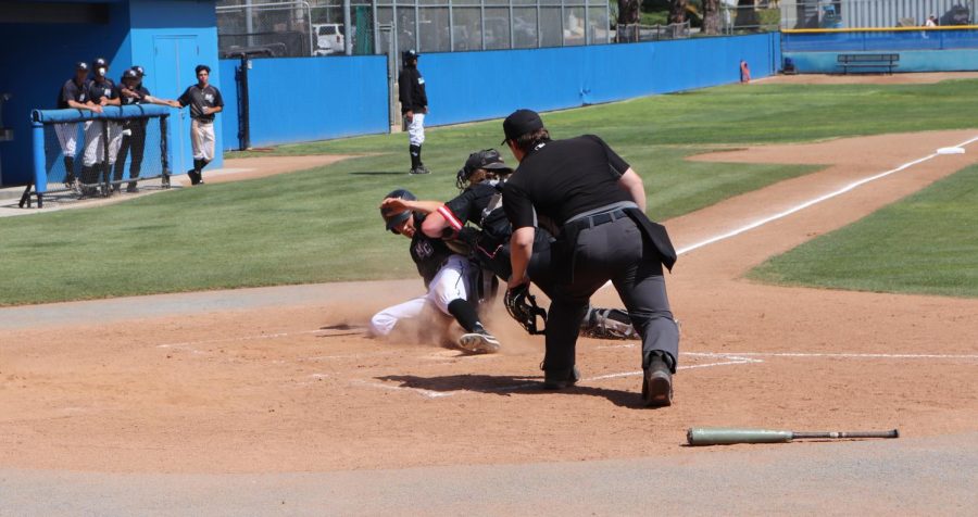 Moorpark Outfielder Michael Jester slideing  into home in the 2nd inning vs Santa Barbra on April 29, 2022, at Moorpark College. Photo credit: Nathan Hafner