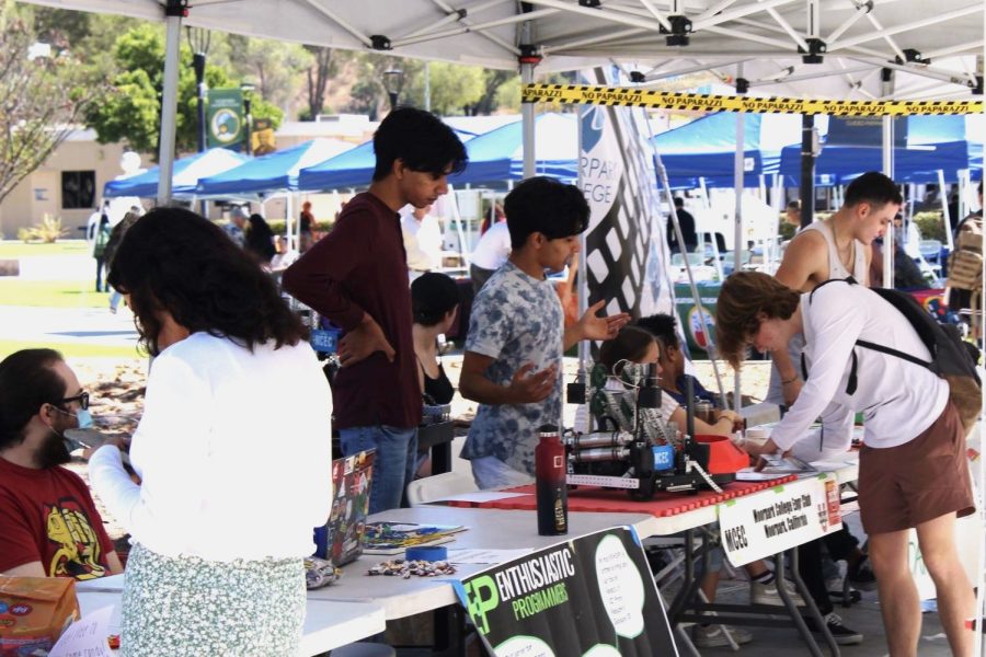 Moorpark College students interact with club representatives lining Raider Walk at the Fall 2022 Club Rush. This semesters Club Rush took place on Sep. 19 and 20. Photo credit: Sarah Graue