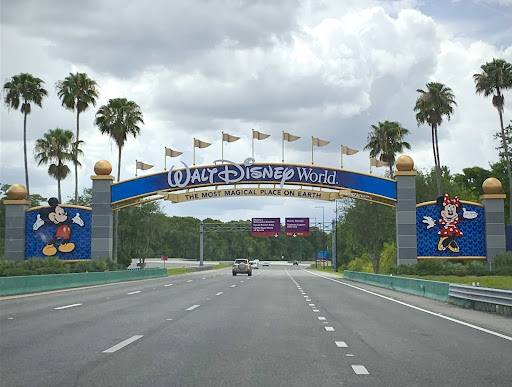 Cars drive through the main gate entrance of Walt Disney World Resort on June 14, 2021. Disney World is a famous attraction in Orlando, Fla., a city that felt the impact of Hurricane Ian. Photo credit: Deborah Hallack