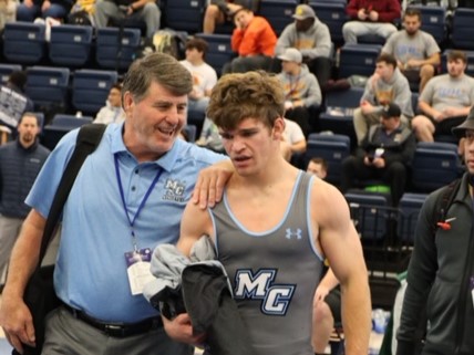 Coach Lindley Kistler and wrestler Zachary Zernick at the CCCAA State Championships Dec. 9-10, 2022 at West Hills College. Zernick reached the quarterfinals and finished 8th place in his weight group. Photo provided by Lindley Kistler