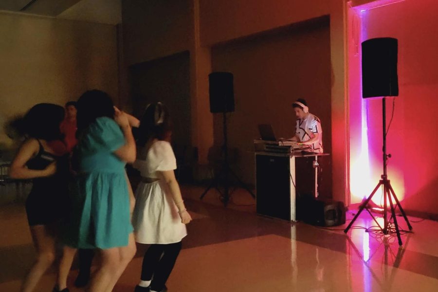 Attendees of the Spring Fling gathered around on the dance floor as a DJ played live music on March 18, 2023 in the Moorpark College cafeteria. Photo credit: Jeise Rogel