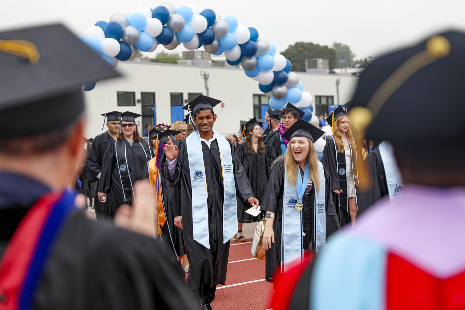 Moorpark College students make their way to the graduation ceremony on Friday, May 19 in Moorpark, CA.