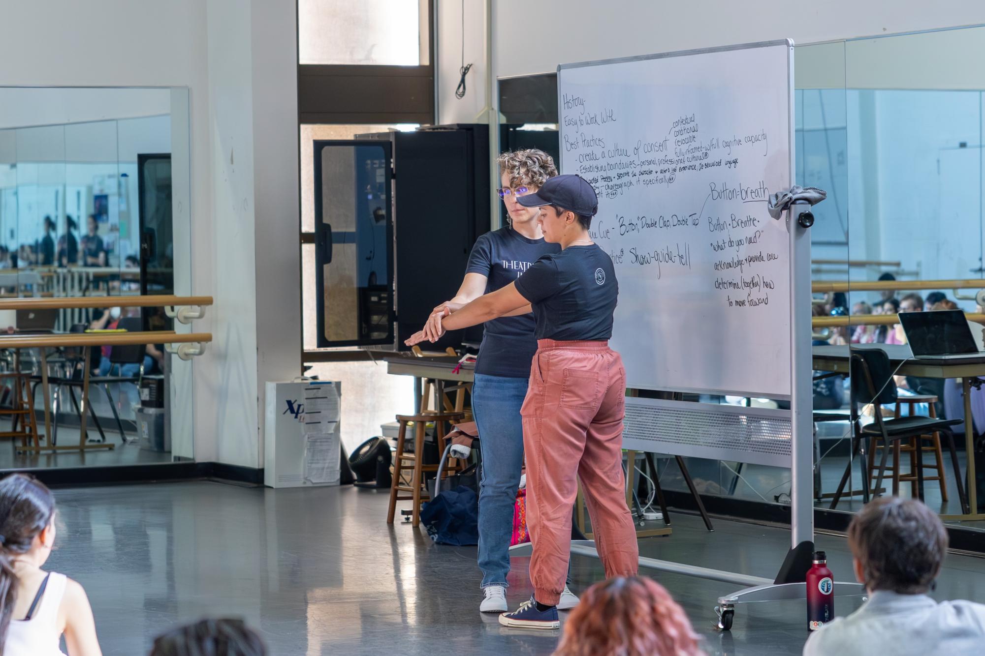 Theatrical Intimacy Education Faculty Members Amanda Rose Villarreal and Jordan Montemayor demonstrate the use of "fences and gates" to show personal boundaries on Sep. 8, 2023.