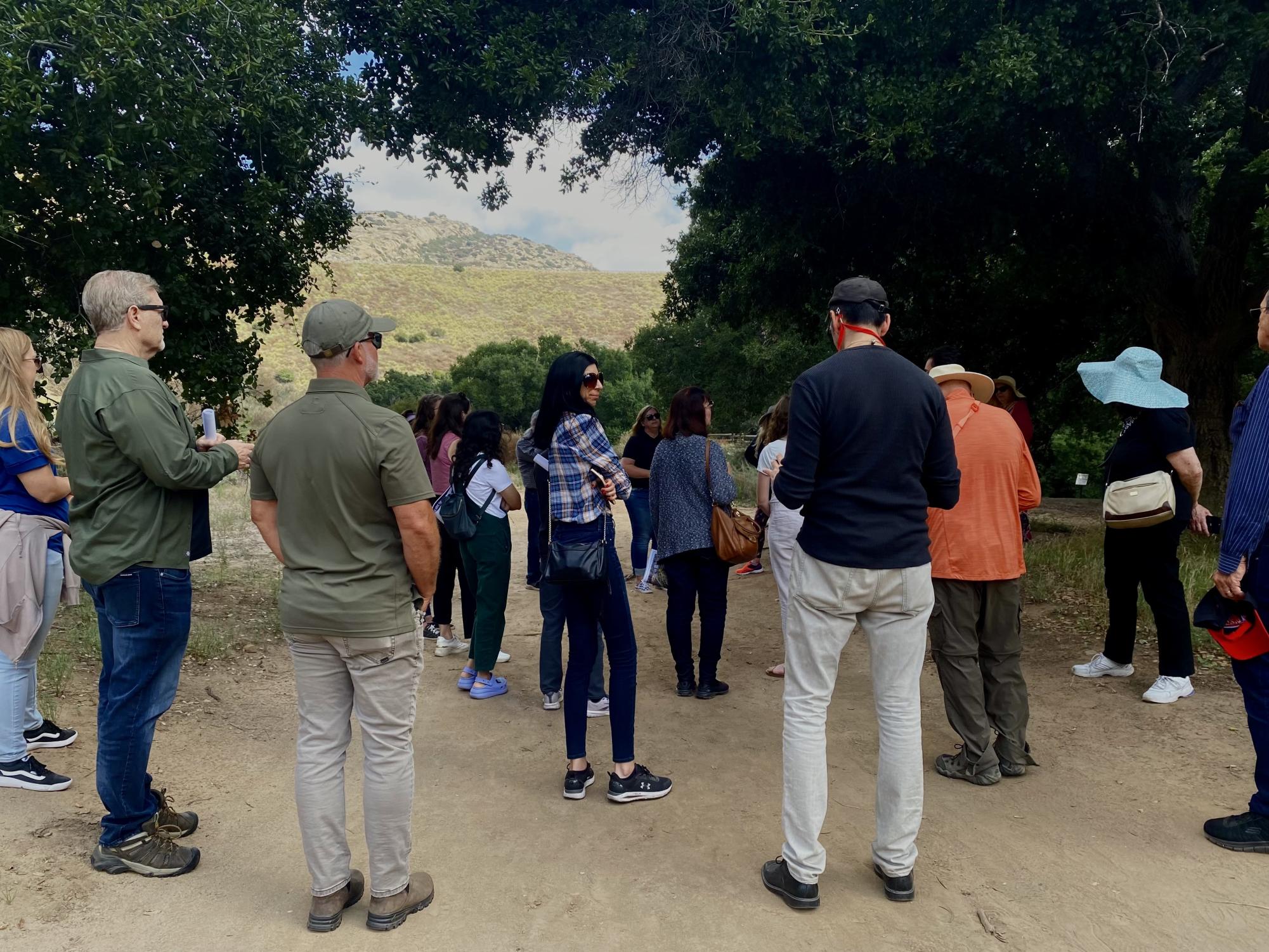 Participants of the field trip gather around prior to a tour of Corriganville Park on Sep. 18, 2023.