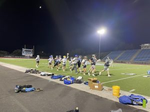 The Moorpark College mens lacrosse team warms up for their practice on Sept. 21, 2023. Photo credit: Briana Cruz