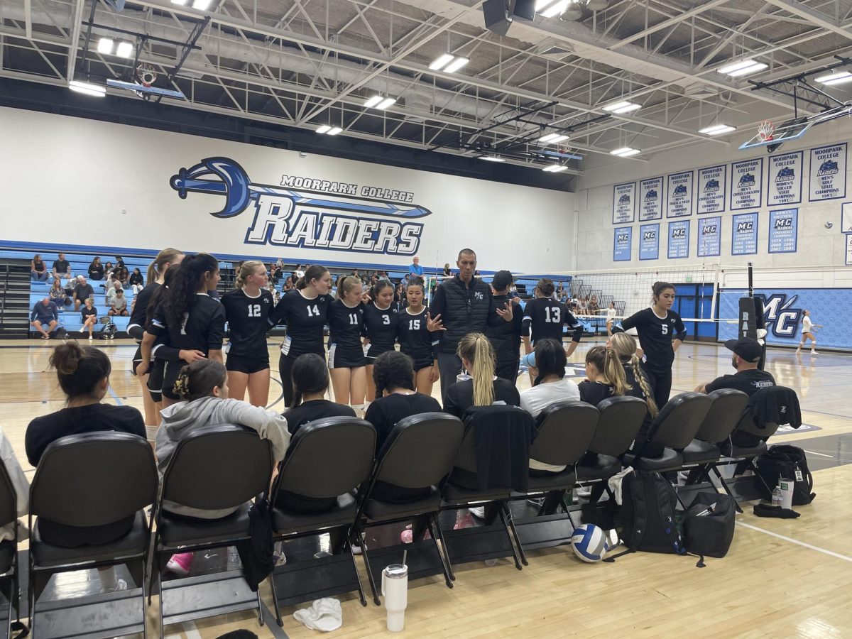 The Moorpark College womens volleyball team use time in between sets to discuss plays as they take on cross-town rivals, the Ventura College Pirates. The Raiders would go on to defeat the Pirates, 4-1, in the Raider Gymnasium. Photo credit: Briana Cruz