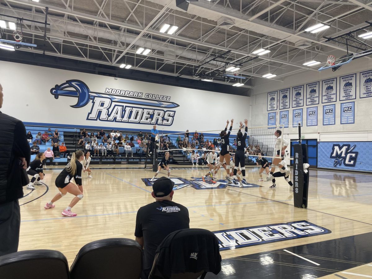 Freshman+middle+blocker+Abby+Montana+and+freshman+setter+Gaby+Schirado+block+a+shot+from+the+Ventura+Pirates+Volleyball+team.+The+Raiders+would+go+on+to+defeat+the+Pirates+in+four+sets+in+the+Raider+Gymnasium+on+Sept.+27%2C+2023.+Photo+credit%3A+Briana+Cruz
