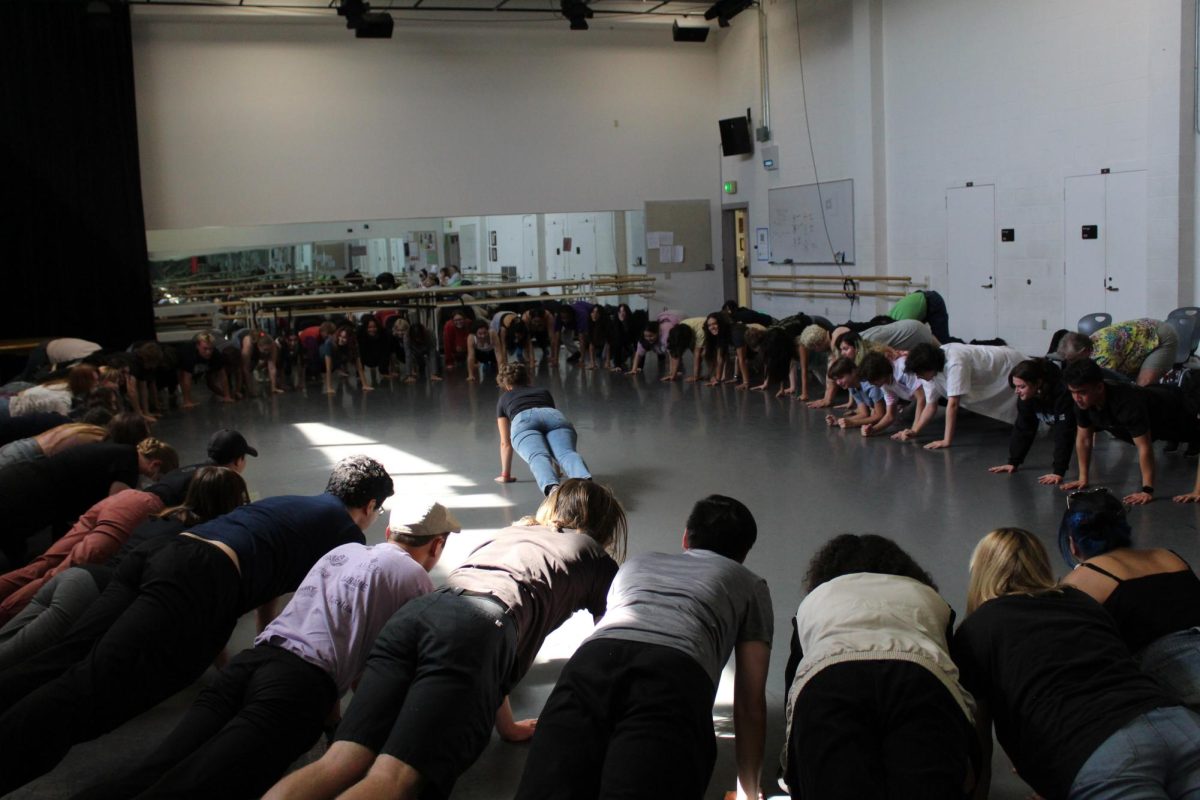 Moorpark College performing arts students complete push-ups at the Theatrical Intimacy Education seminar on Sep. 8, 2023. Photo credit: Sarah Graue