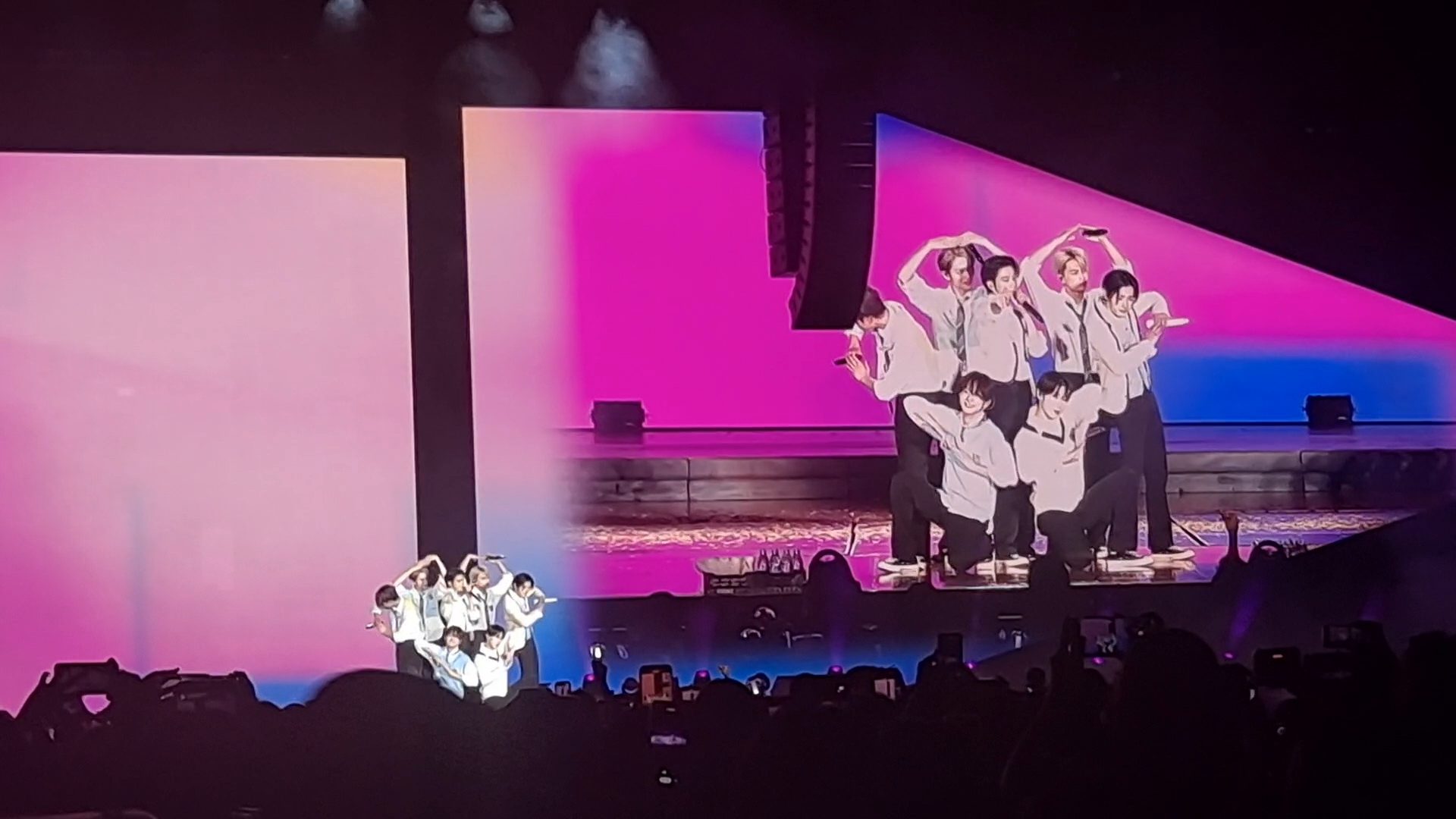 ENHYPEN creates a heart for their fans at the "Fate" Tour in Los Angeles on Oct. 6, 2023.