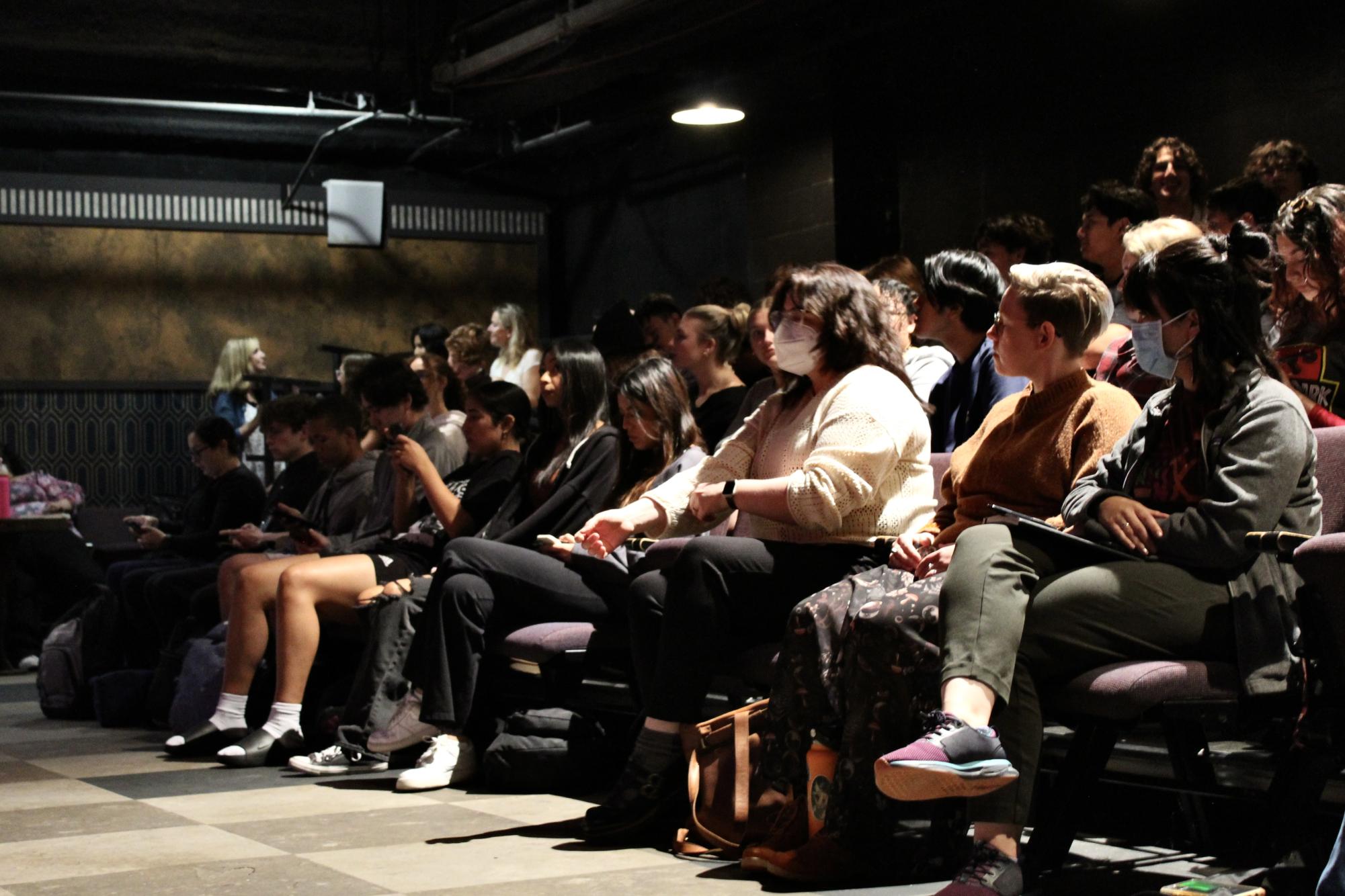 The Black Box Theater at full capacity with students listening to a live poetry performance by Yesika Salgado on Oct. 2, 2023.