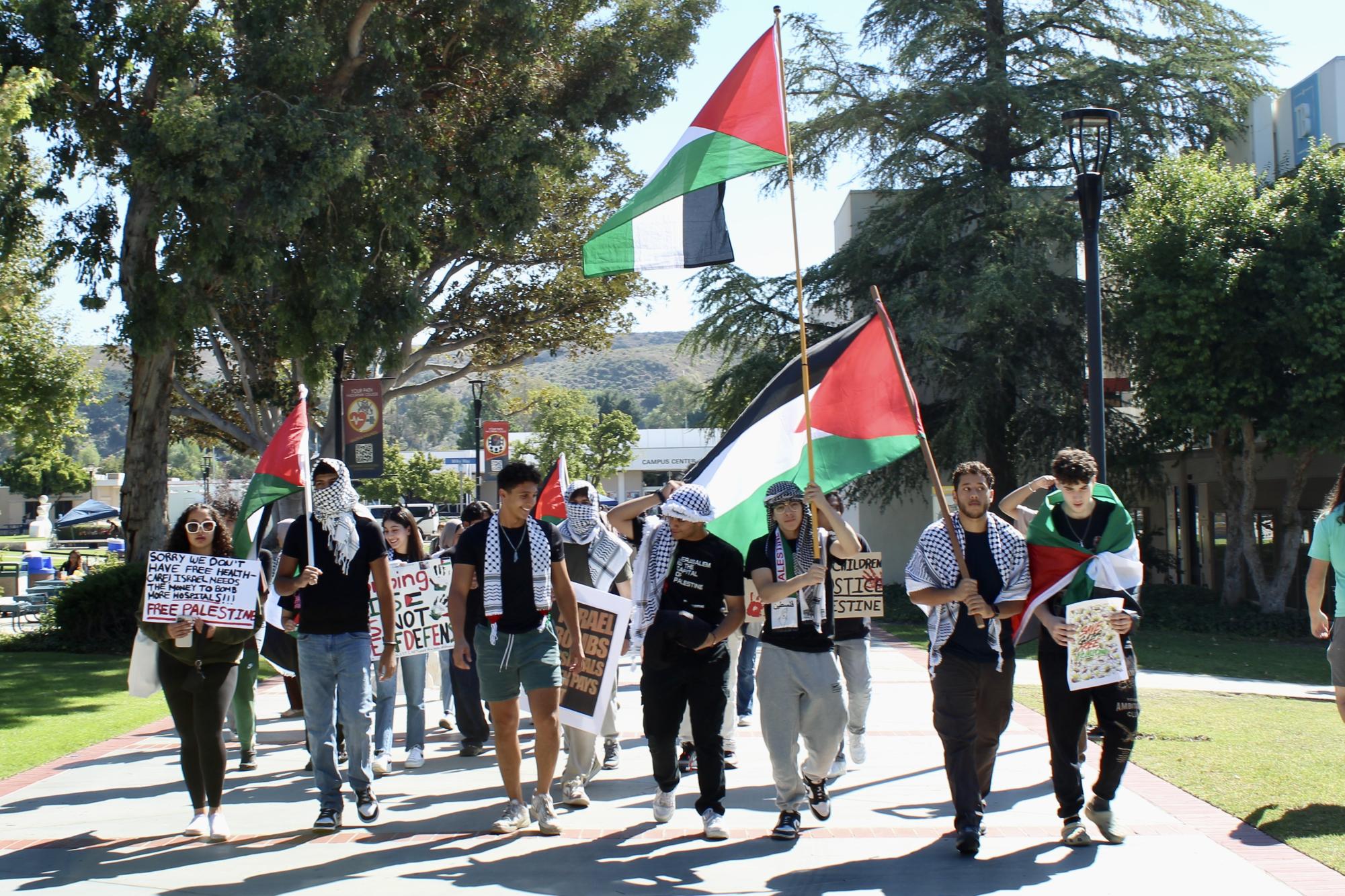 Moorpark College Muslim Students Association members lead a march through Raider Walk at their "Protest for Palestine" on Oct. 19, 2023.