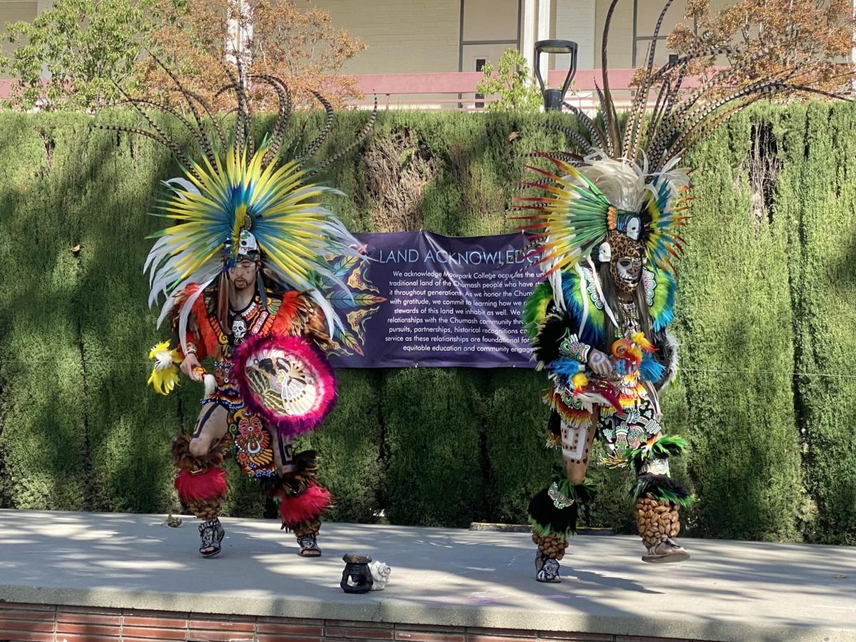 Members of Tlanextli Tlacopan Aztec Fire Dancers perform a traditional dance at Moorpark College on Nov. 14, 2023. Photo credit: Pierre Michelet