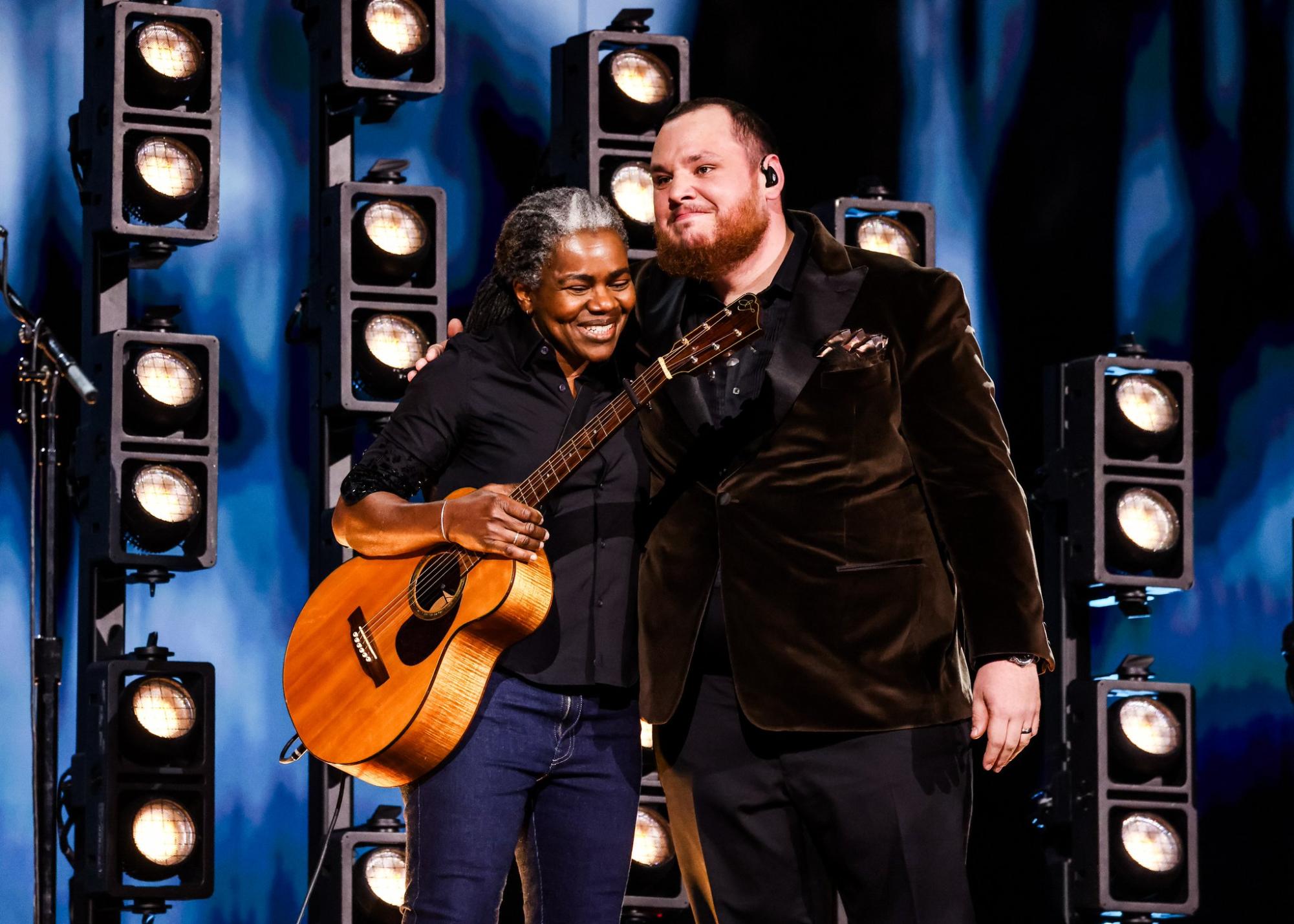 Renowned singer-songwriter Tracy Chapman and country nominee Luke Combs embrace following their performance of Chapman&squot;s 1988 song "Fast Car" on Feb. 4, 2024. Image courtesy of the Recording Academy on X.