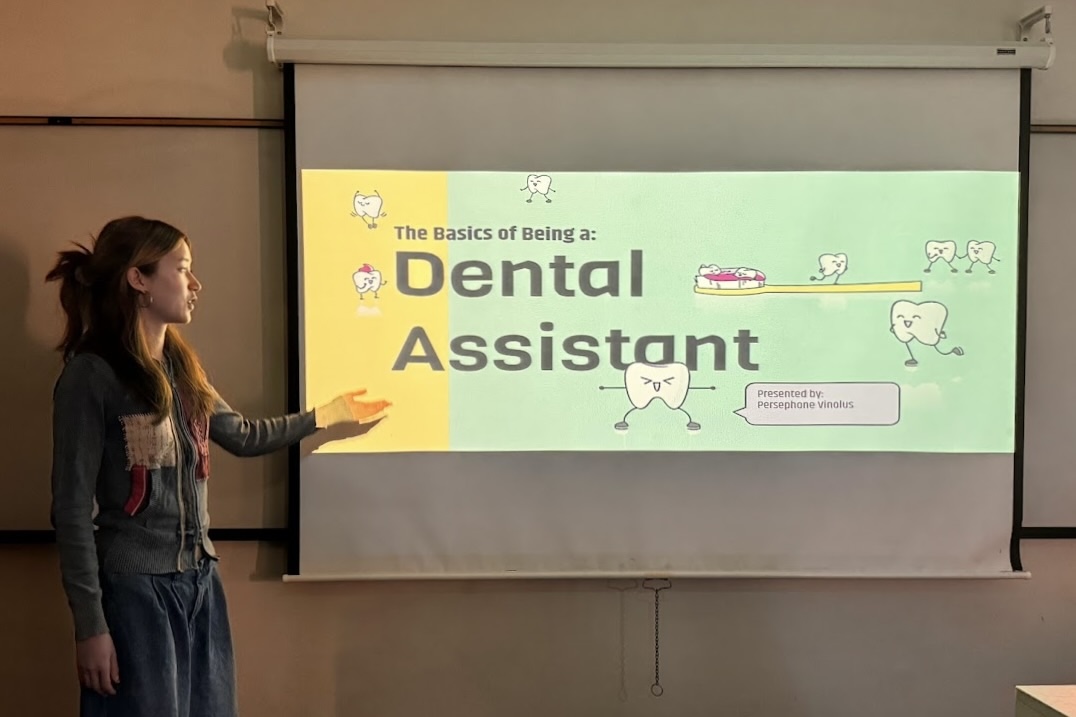 Pre-Dental Club President Chloe Lin explains the basics of being a dental assistant on Jan. 31, 2024. Photo credit: Samantha Kline