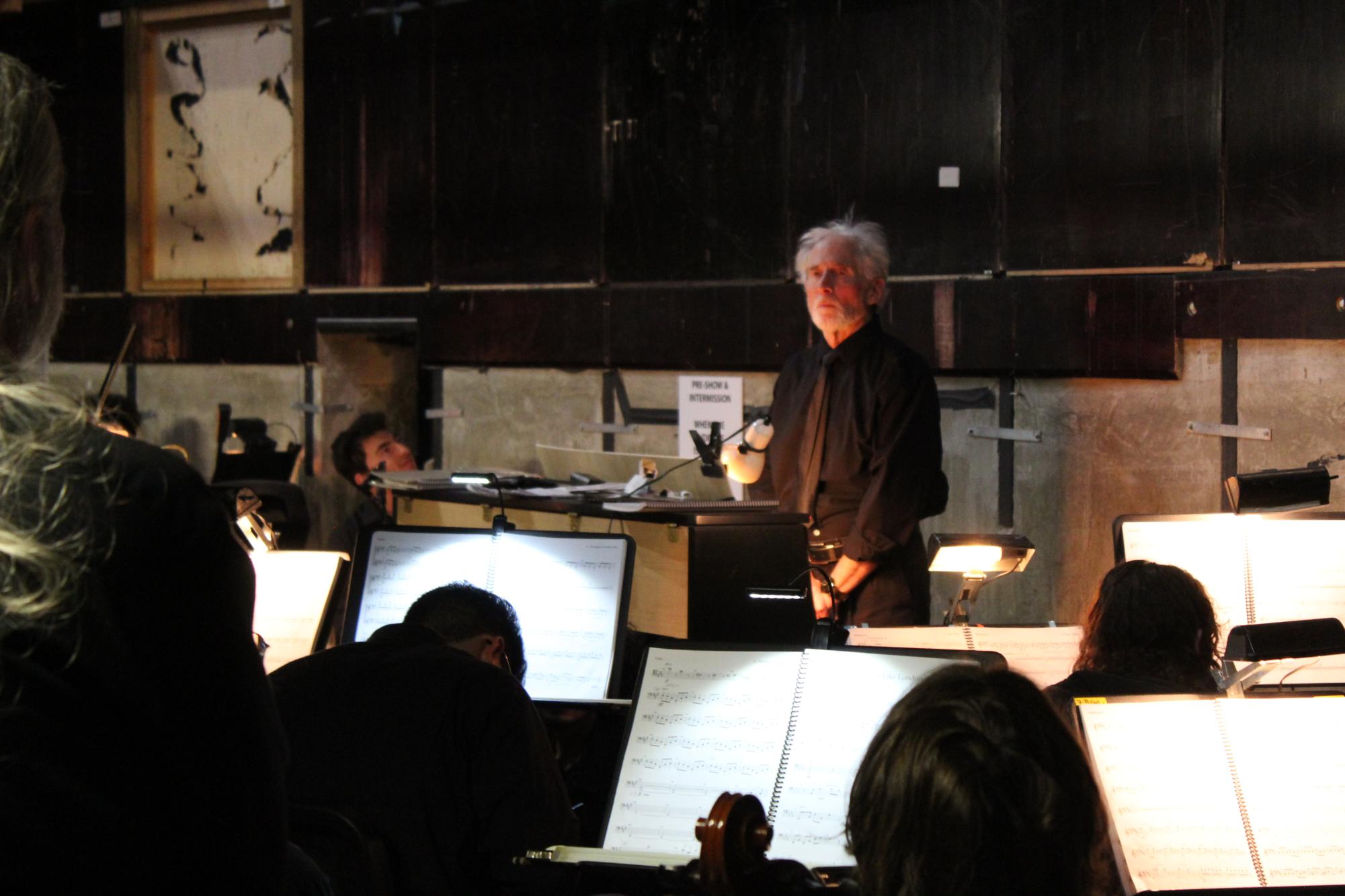 Conductor of the orchestra, David Watkins, leading students during opening night of "Sweeney Todd: The Demon Barber of Fleet Street" on March 14, 2024.