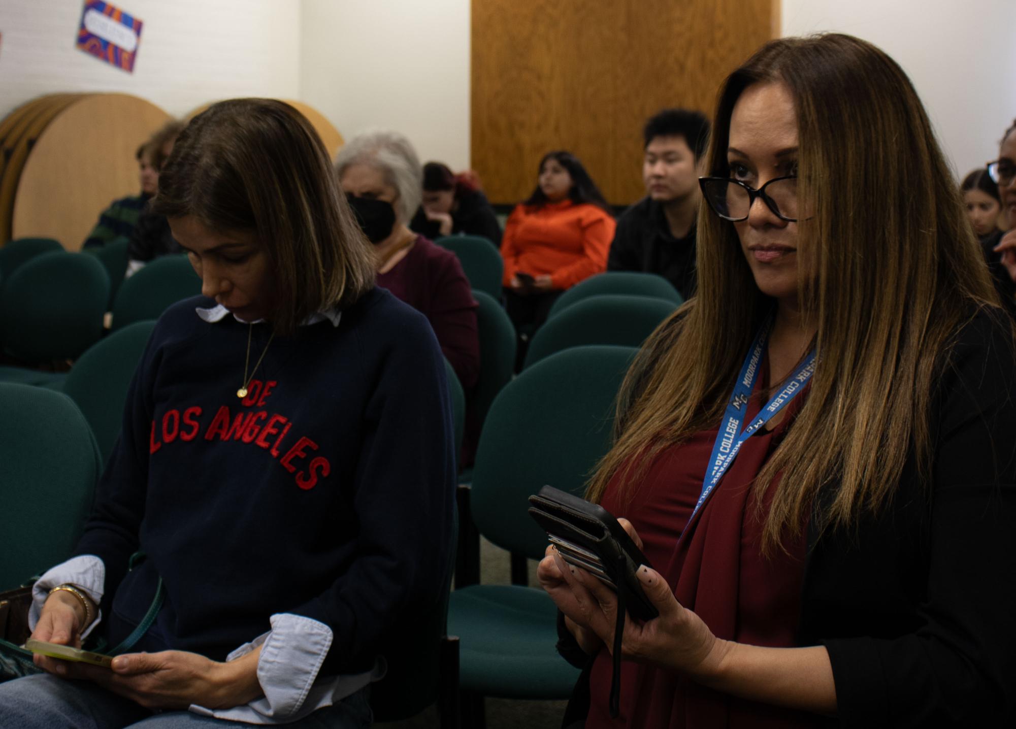 (from left) Angelica Eurbus, 48, and Marnie Melendez, 52, intensely compete against each other in Kahoot! during the Jamaal Brown Presentation at Moorpark College on Feb. 14, 2024. (Photo by Carson Ryan)