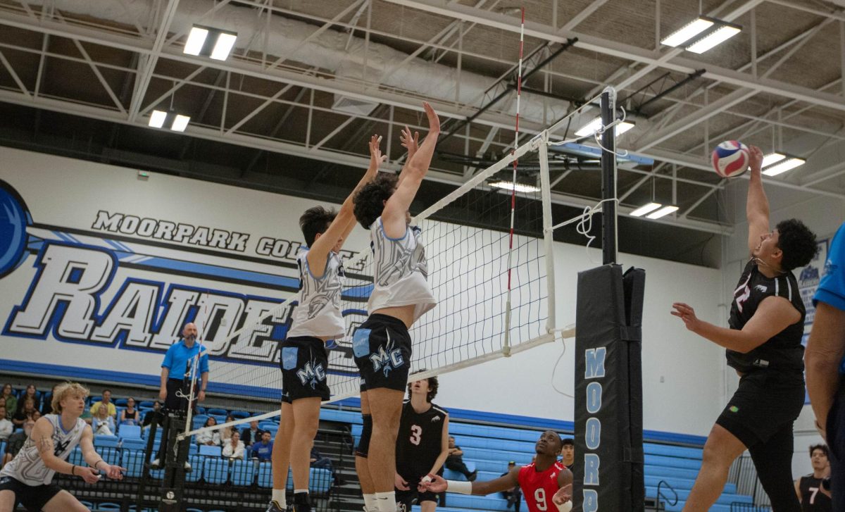 Pierce+Colleges+Outside+Hitter+Vincent+Harris+%2812%29%2C+hits+against+the+Moorpark+block+set+by+Opposite+Taylor+Phipps+%2819%29%2C+and+Middle+Blocker+Brandon+Baez+%2820%29%2C+during+Moorparks+four+set%2C+%283-1%29%2C+win+over+LA+Pierce+on+Wednesday%2C+March+13%2C+2024+in+Moorpark%2C+Calif.+Photo+credit+Jimmy+Jacobs.