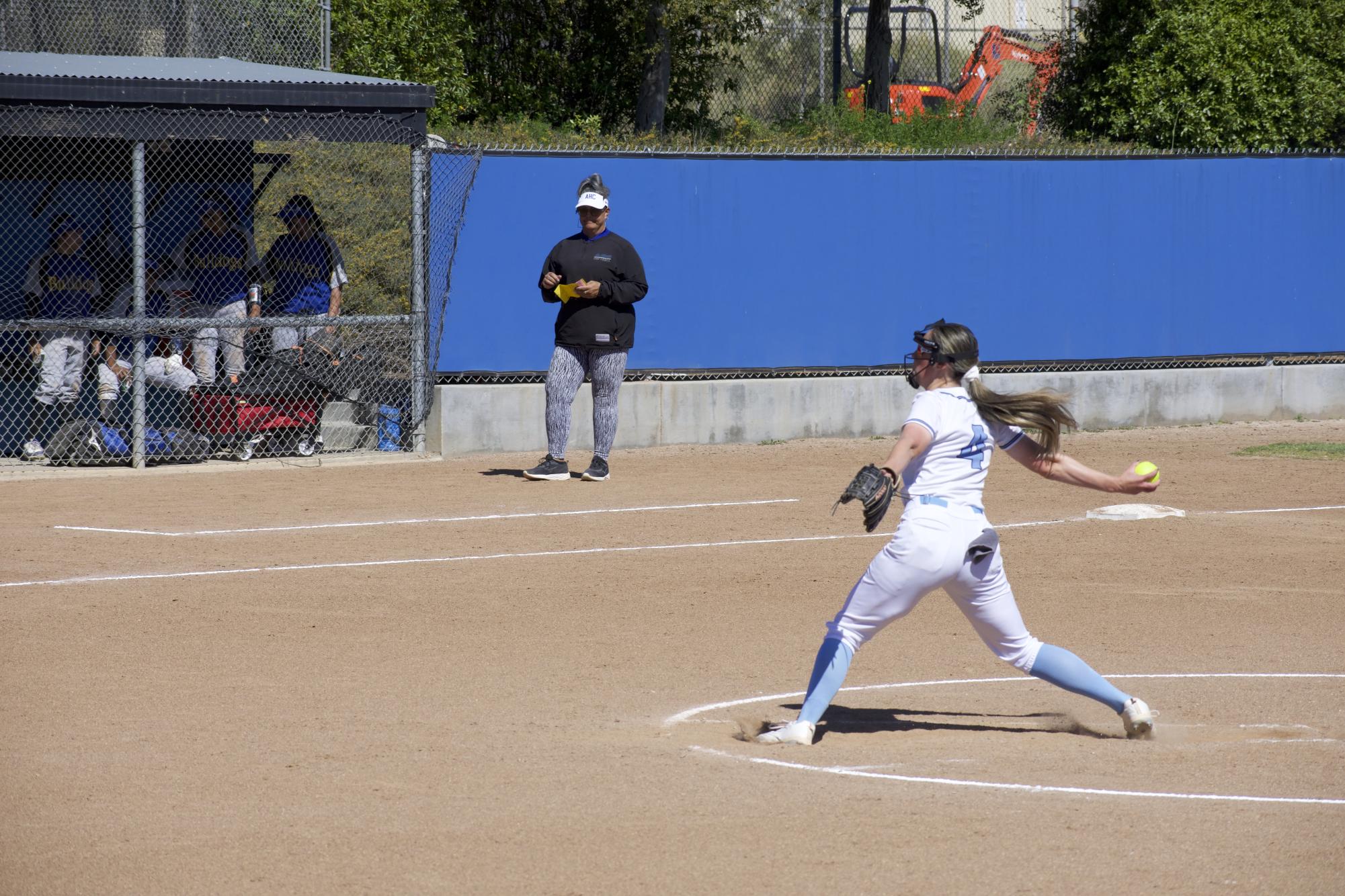 Freshman starting pitcher #4 Amanda Smith winds up to deliver a pitch against the conference rival Bulldogs on April 9, 2024.