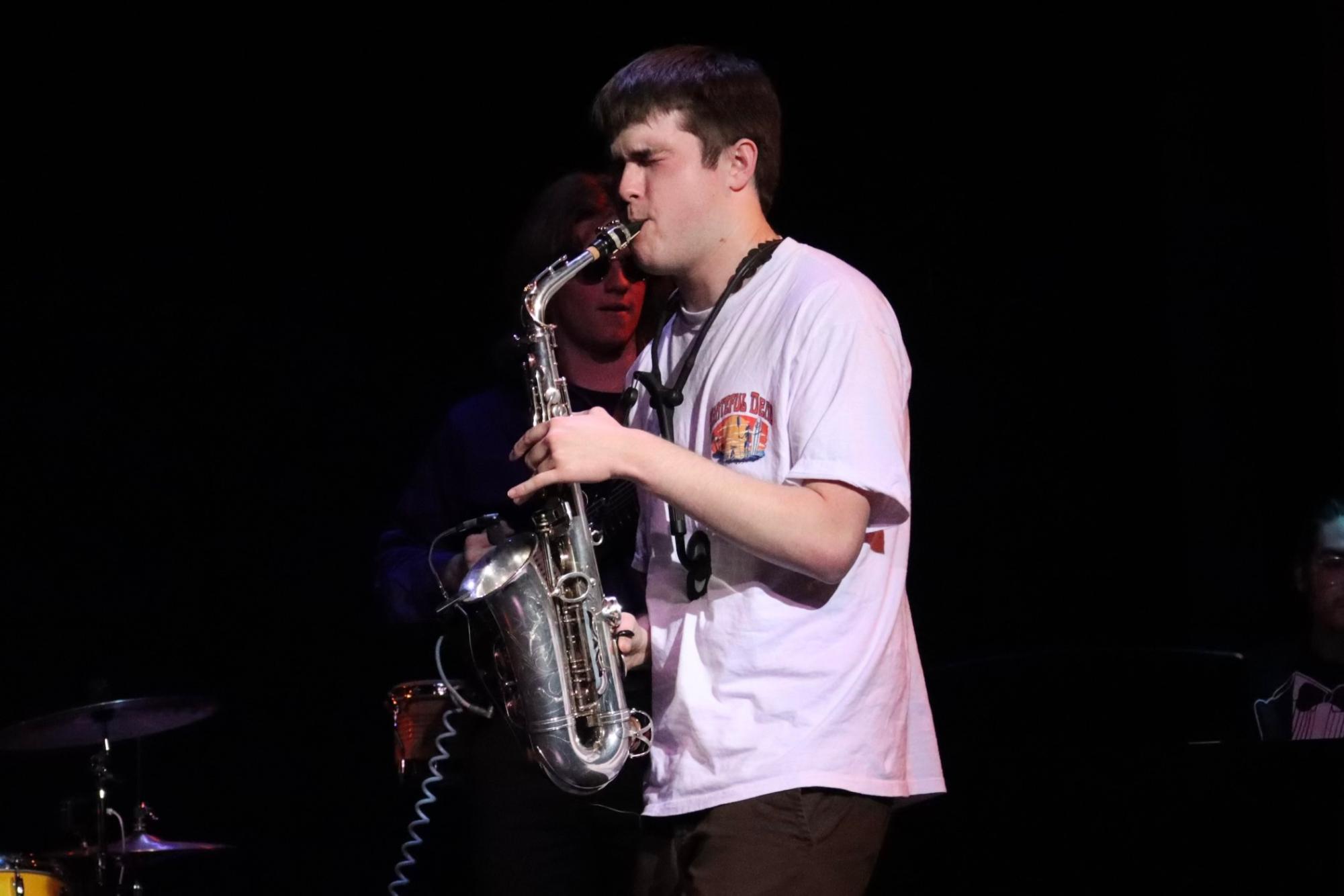 James McDonough performs "Porsche Beat" alongside Moorpark College student musicians at the "Come Together" music technology showcase on April 12, 2024.