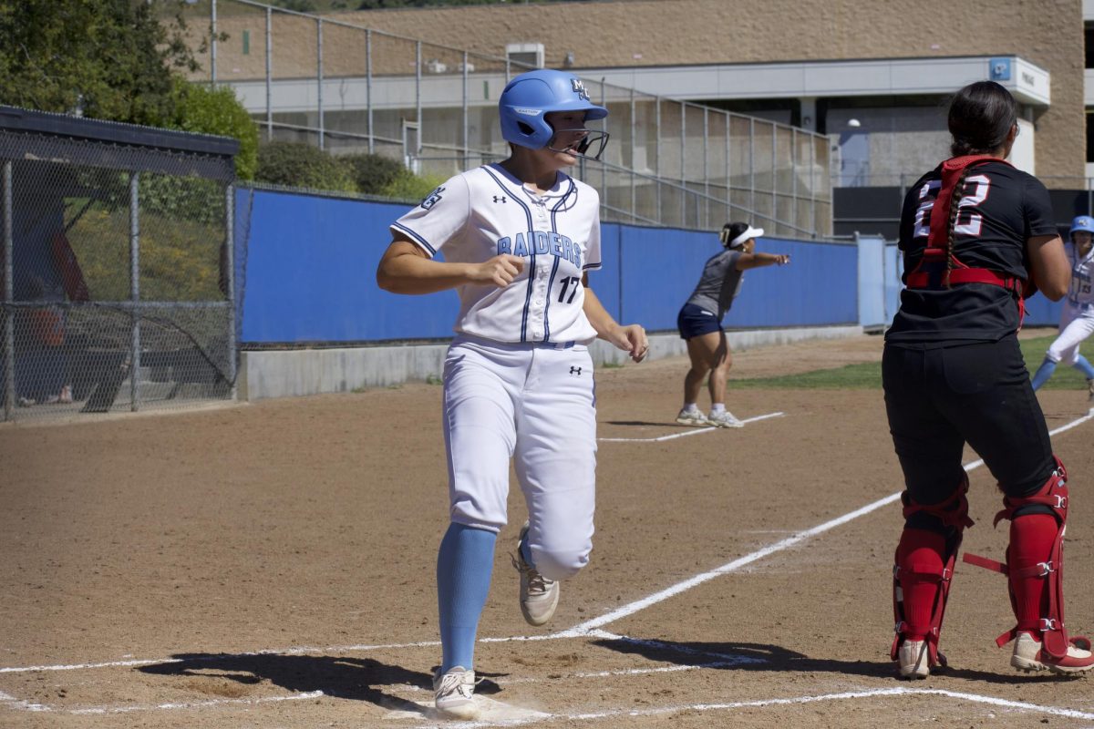 Moorpark freshman slugger #17 Kylie Kolkowski steps on home plate to score one of her two runs against the Vaqueros at Moorpark College on April 16, 2024. Photo credit: Clayton Byrne