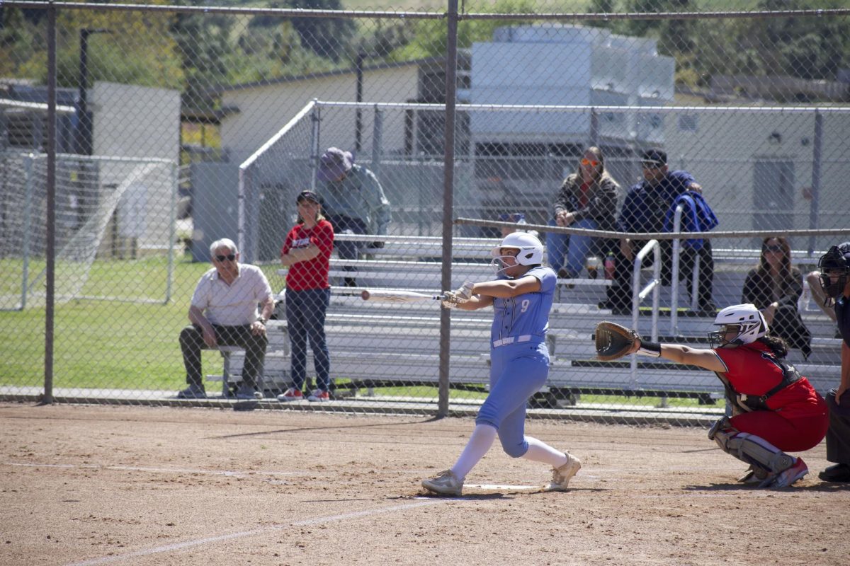 Moorpark College sophomore #9 Maddy Mekari delivers a crucial fifth inning single to right-field against Pierce College on April 18, 2024. Photo credit: Clayton Byrne