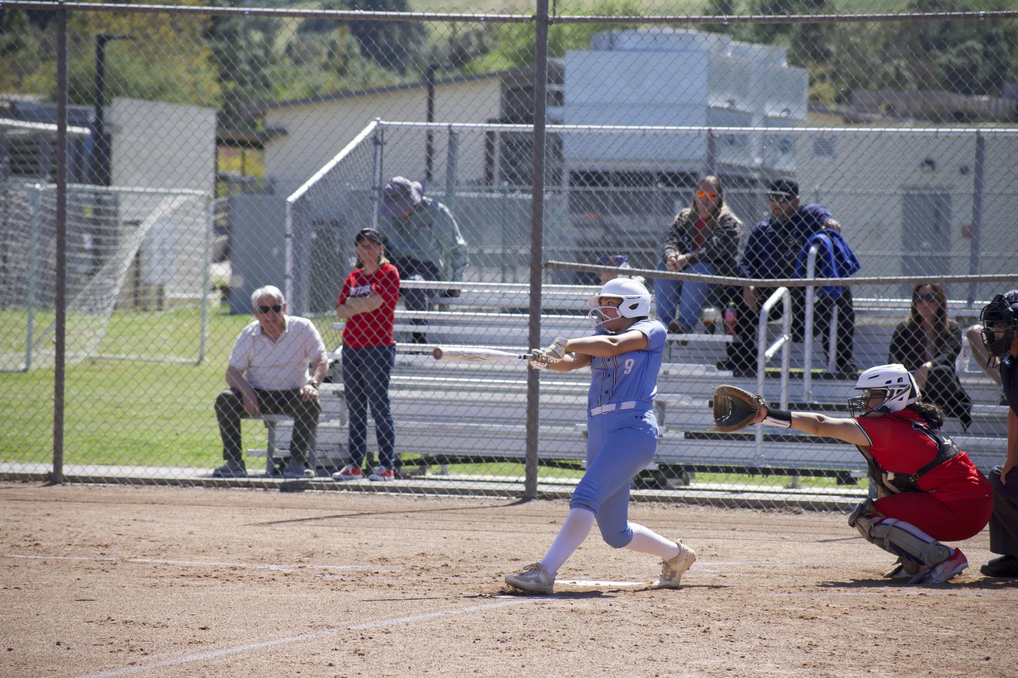 Moorpark College sophomore #9 Maddy Mekari delivers a crucial fifth inning single to right-field against Pierce College on April 18, 2024.