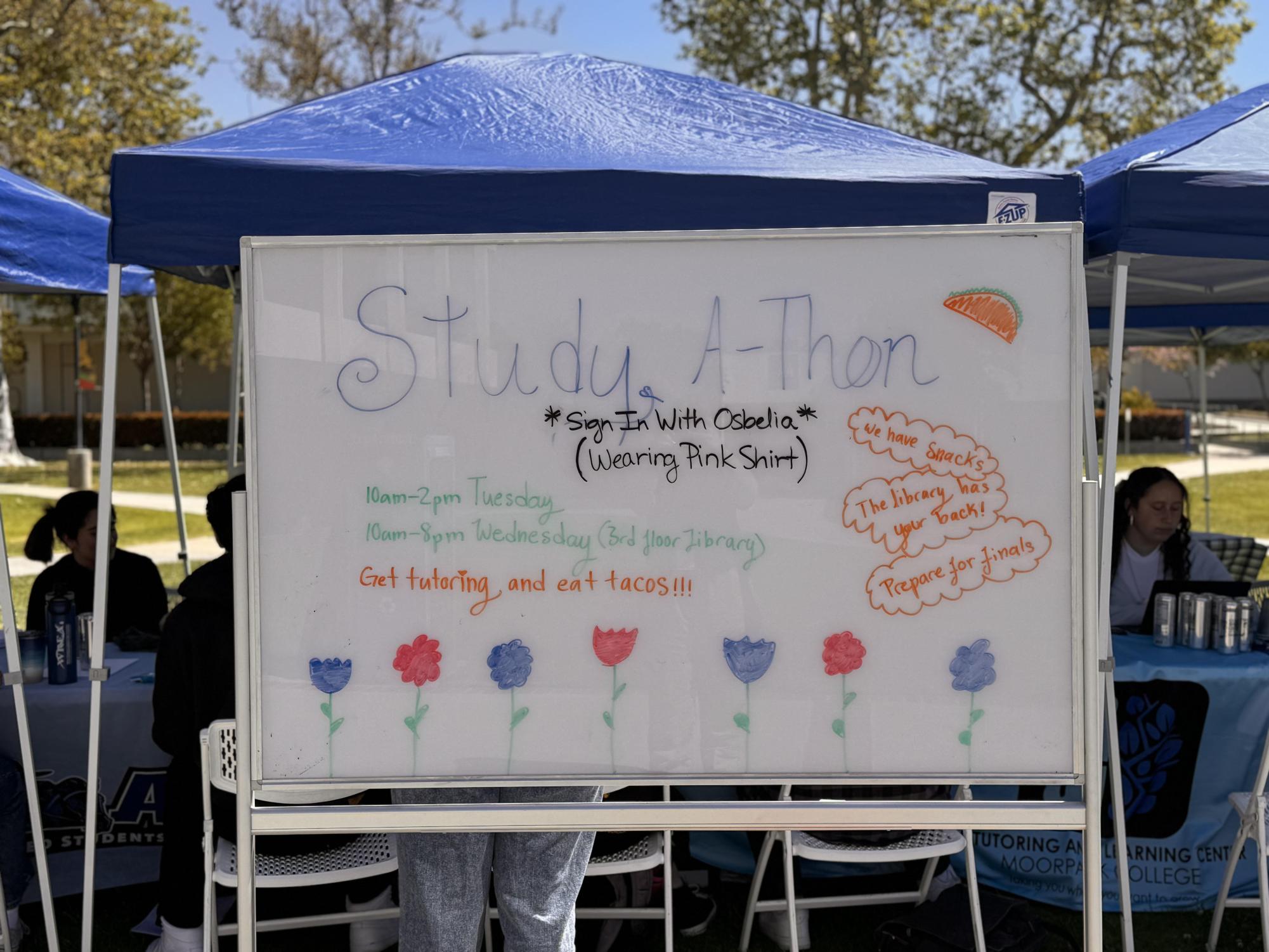 A whiteboard placed in front of the Study-A-Thon encouraging students to stop by on May 7, 2024.