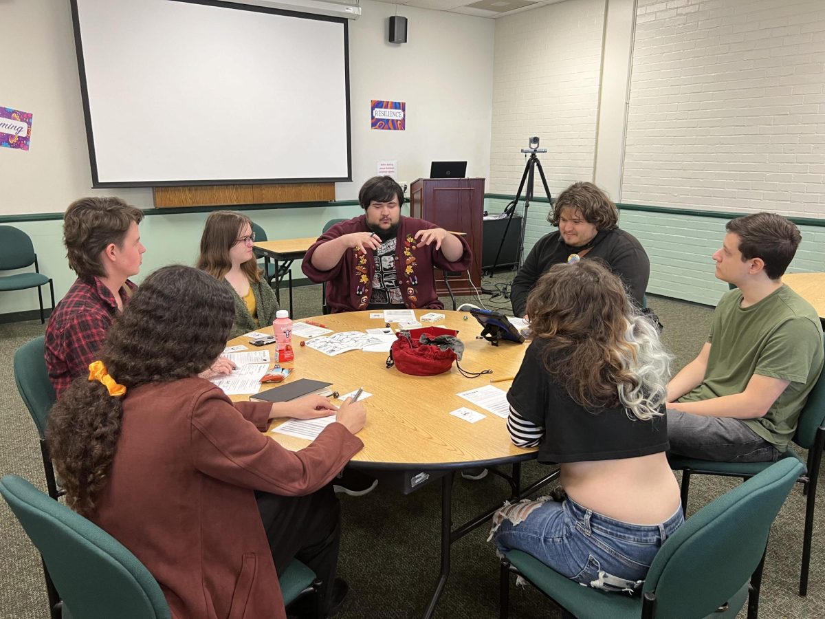 Members of Wizards Club playing a game of Raccoon Sky Pirates at their club meeting on April 26, 2024 at Moorpark College. Photo credit: Natalie To