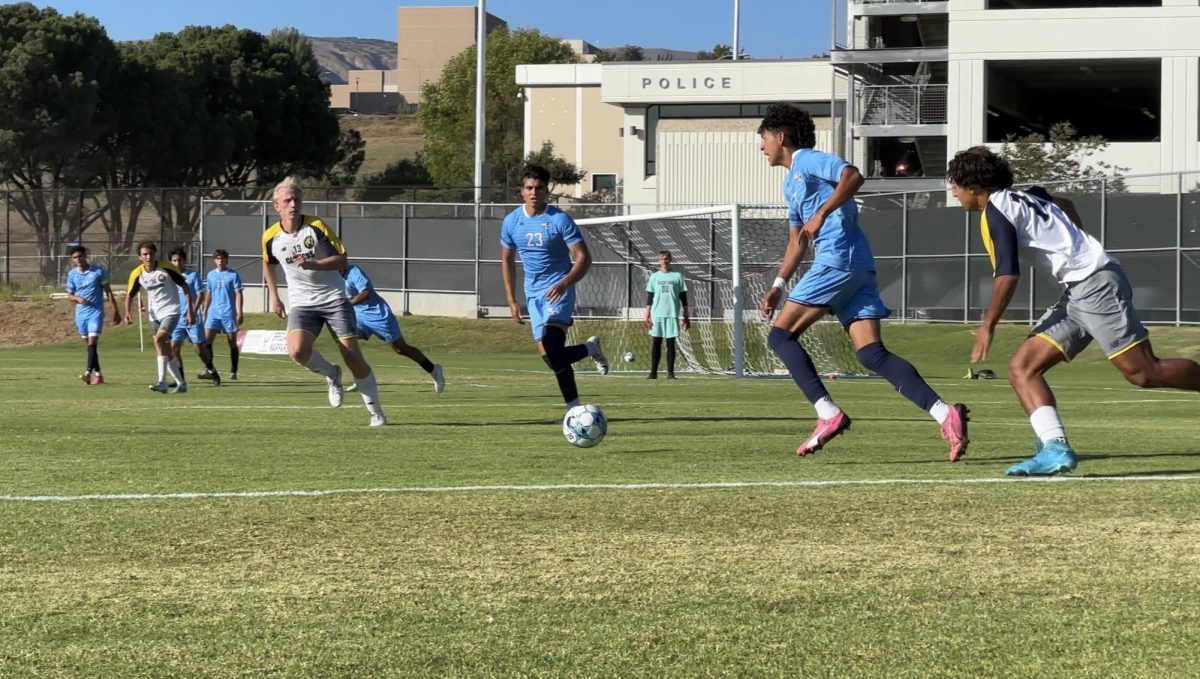 #7 sophomore Jose Pacheco pushes forward towards his teammates in Moorpark, Calif. on Tuesday, Aug. 27, 2024. Photo credit: Luis Zambrano