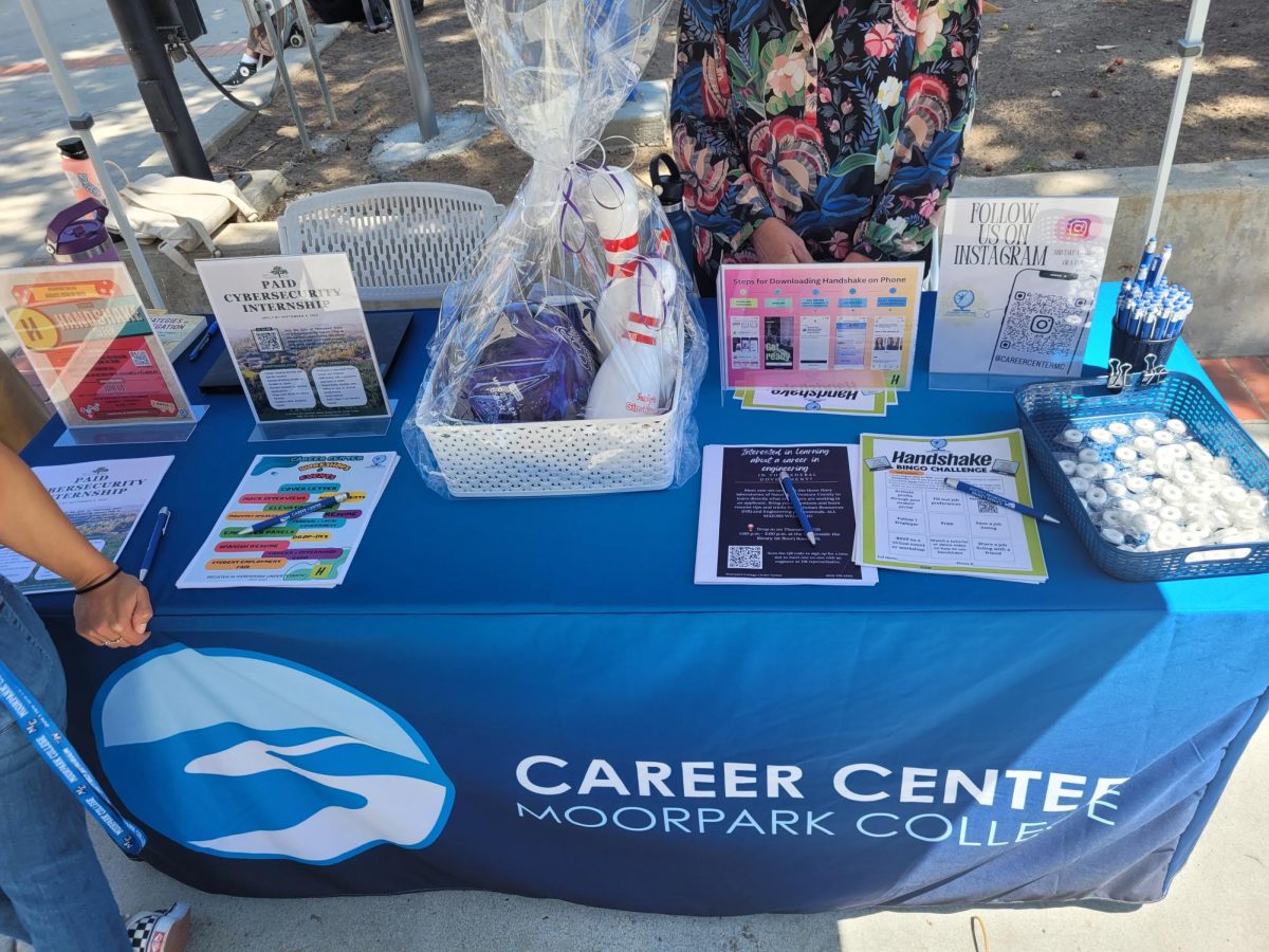 The Moorpark College Career Center's table set up with flyers, pens and mints in Raider Walk for Moorpark College's Transfer Event on Thursday, Aug. 29, 2024 in Moorpark, Calif. Photo credit: Alexxis Marin