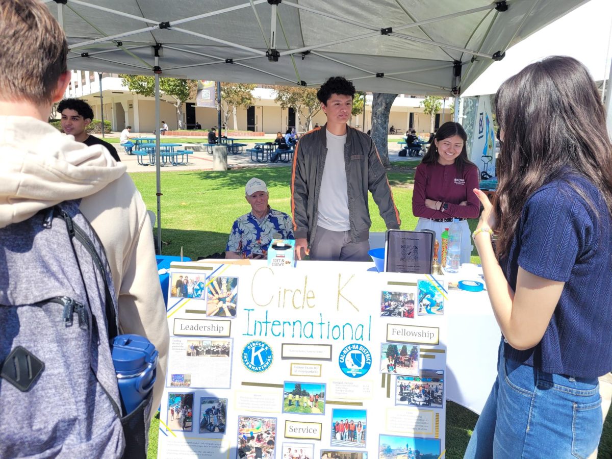 Circle K International Secretary Paul Oseguera and President Raquel Kanalz interacting with students at Moorpark College's Fall Club Rush in Moorpark, Calif. on Tuesday, Sept. 24, 2024. Photo credit: Alexxis Marin