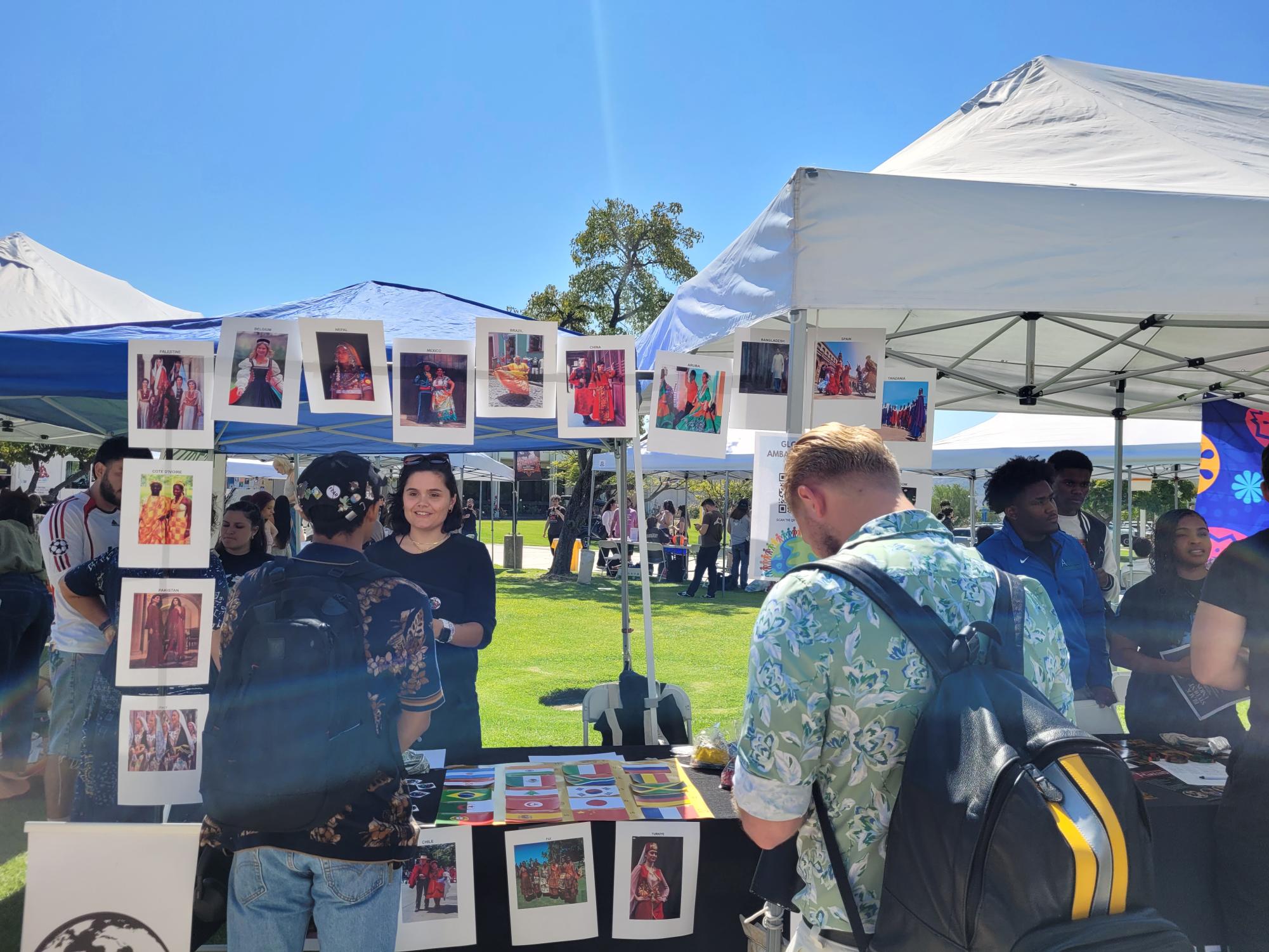 Global Ambassadors member talking to a student on Raider Walk at Club Rush in Moorpark, Calif. on Tuesday, Sept. 24, 2024.