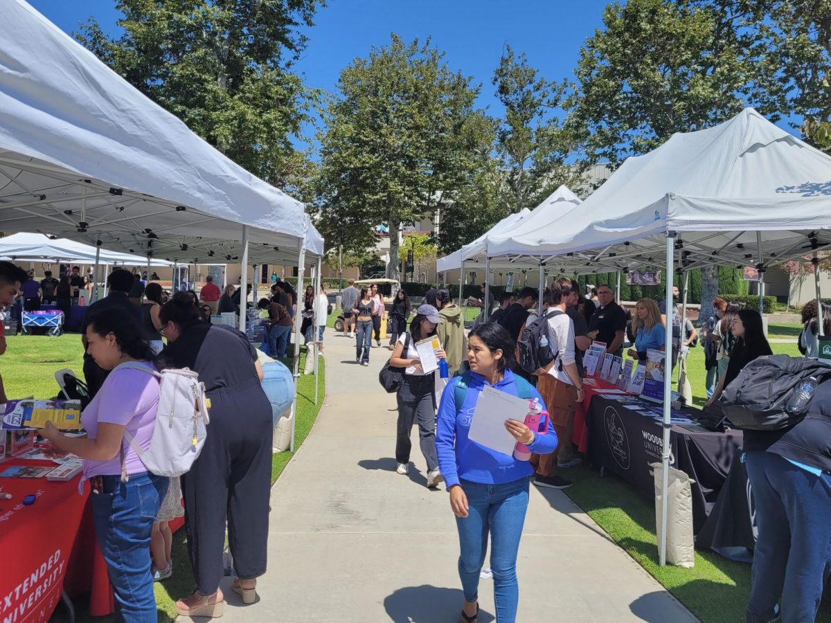 Moorpark College students fill Raider Walk to meet with university representatives at the Transfer Day event in Moorpark, Calif. on Thursday, Aug. 29, 2024. Photo credit: Alexxis Marin