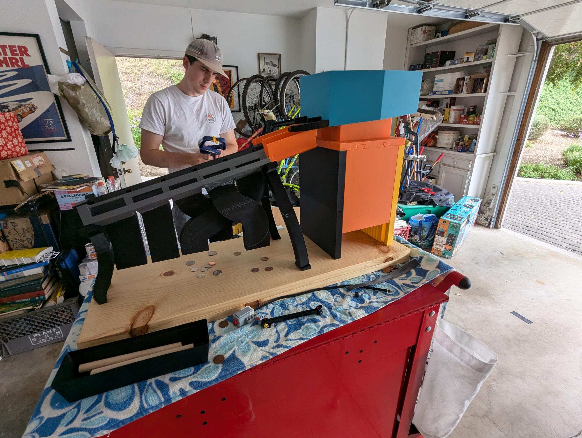 Kyle Ponti analyzes his team’s collaborative creation before they officially demonstrate it later that day. The team was crowned victorious as the winning team of the design project, composed of Emily Dahl, Ben Mudgett, Kyle Ponti and Mitchell Prokey. Photo courtesy of Ben Mudgett.