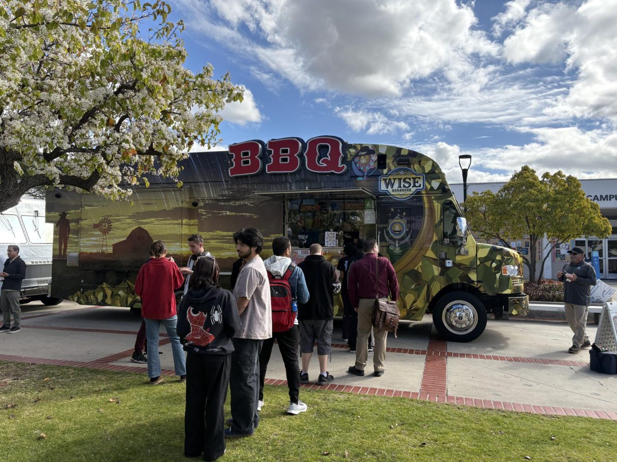 Students lined up along the pathway of the quad to get their complimentary food as part of participating in the Black History Month opening ceremony on Tuesday, Feb. 4, 2025 in Moorpark, Calif. Photo credit: Danielle De Leon