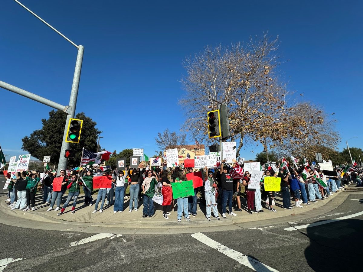 Protesters gathered on the corner of New Los Angeles Avenue and Spring Road in Moorpark, Calif. on Sunday, Feb. 2, 2025. Photo credit: Luis Zambrano